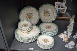 A quantity of Royal Doulton bone china Kingswood pattern dinner wares, comprising various plates and