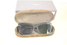A pair of Kit Astuccio Rigido B6 UOMO Tom Ford Womens Sunglasses, with original chocolate brown box,