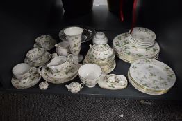 A set of 41 late 20th-century Wedgwood bone china 'Wild Strawberry' full-sized tea set pieces,