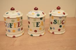 A group of three Emma Bridgewater polka dot pattern lidded storage jars, Coffee, Tea and Sugar,