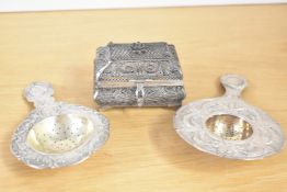 Two continental 800 grade white metal decorative tea straining spoons and one Russian 800 grade