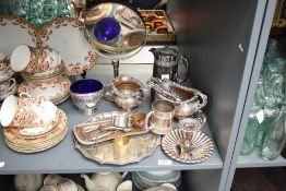 A selection of miscellaneous silver plated wares, to include sugar & cream, candle snuffers, salver,