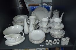 A set of 52 pieces of Royal Doulton English Fine Bone China ‘Carnation’ tableware, including, for