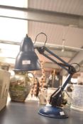 A late 20th-century British Home Stores metal blue Anglepoise lamp, having a bell shaped shade,