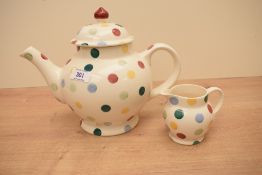 An Emma Bridgewater pottery polka dot pattern teapot and milk jug, printed marks to base, teapot