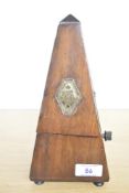 A 19th century French Maelzel Paquet wooden Metronome, having pyramid-shape design, a brass plaque