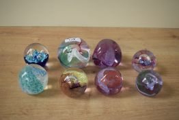 A Caithness Mooncrystal glass paperweight, h4.5cm, sold together with 4 others