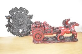 Two modern Chinese Decorative arts resin ornaments, featuring a large red resin statue of horses