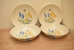 A group of four Emma Bridgewater pottery Little Daffodils pattern bowls, printed marks to base 24cm