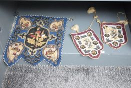 A Victorian beadwork hanging or pennant, decorated with foliate designs 45cm x 36cm and sold
