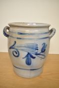 A large 20th century German Westerwald style stoneware two handled pot, having a decorated blue