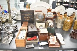 An early 20th-century Wells Empson and Company metal Pure Tea caddy, a Genatosan Limited glass metal