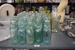 A collection of forty five antique glass Codd necked bottles, various to include W.C Farrar