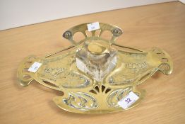 A 20th century Austrian Brass Art Nouveau style inkwell desk set, marked Geschutzt, featuring