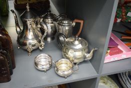 A silver-plated three-piece teaset, of circular form comprising teapot, sugar and cream nd sold