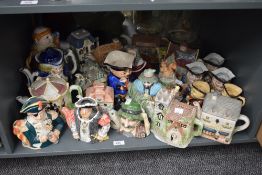 A quantity of tea pots, to include a Monk, Fisherman and School ect