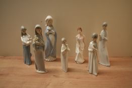 A group of seven Lladro porcelain and similar figurines to include Lladro figurine 'Girl with