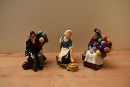 A group of three Royal Doulton bone china figures/figurines comprising 'The Apple Maid' HN 2160, '