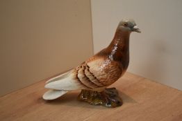 A Beswick Pottery Pigeon study model number 1383 designed by Mr Orwell in brown gloss finish.