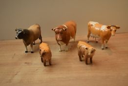 A group of five Beswick Pottery cattle studies comprising Jersey Bull CH. 'Dunsley Coy Boy' model