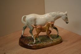 A Royal Doulton bone china figure group 'The Gude Grey Mare' HN 2532 designed by W.M. Chance.