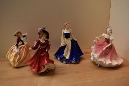 A group of four Royal Doulton bone china figurines comprising Figure of The Year 2008 'Olivia' HN