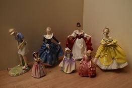 A group of seven Royal Doulton bone china figurines comprising 'Dinky Do' HN 1678, 'Rose' HN