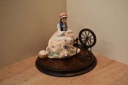 A Royal Doulton bone china limited edition The Gentle Arts series figurine 'Spinning' HN 2390,