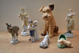 A selection of figurines and studies to include a large Sylvac Terrier etc.