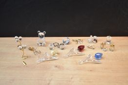 A group of Swarovski Crystal Glass animal studies and ornaments to include teddy bears, gift boxes