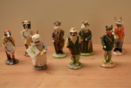 A group of eight Beswick Pottery English Country folk studies comprising 'Hiker Badger' ECF 6, '