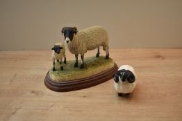 A Border Fine Arts animal group 'Swaledale Ewe and Lambs' model number A1248 sold together with a