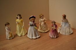 A group of five Royal Doulton bone china figurines including 'Daddy's Girl' HN 3435 and 'Sharon'