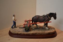 A Border Fine Arts figure group 'Lightly Rolled' model number A8918 designed by Hans Kendrick.