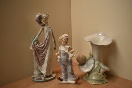 A group of three Lladro porcelain and similar studies to include 'Socialite of the 1920's' model