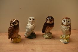 A group of four Royal Doulton bone china Whyte & Mackay Owl decanters comprising 'Snowy Owl', '
