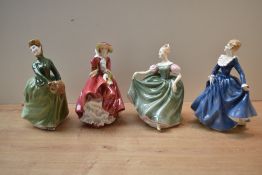 A group of four Royal Doulton bone china figurines comprising 'Fragrance' HN 2334, 'Michele' HN