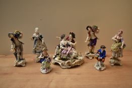 A group of seven Capo Di-Monte porcelain and similar figures/figurines.