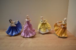 A group of four Royal Doulton bone china figurines comprising Pretty Ladies figurine of the year