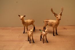 A Beswick Pottery Deer Family comprising Stag (Standing) model number 981, Doe model number 999A and