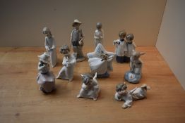 A group of ten Lladro and Nao by Lladro figures/figurines to include 'Girl with Candle' model number