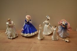 A group of six Royal Doulton bone china figurines comprising Figure of The Year 1992 'Mary' HN 3375,