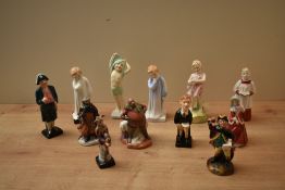 A group of eleven Royal Doulton bone china figures/figurines to include 'Jester' HN 3335, 'Falstaff'
