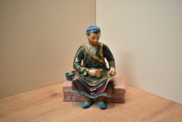Reg Johnson, Formerly of Royal Doulton, studio pottery figure 'Egyptian Water Carrier' measures 16cm
