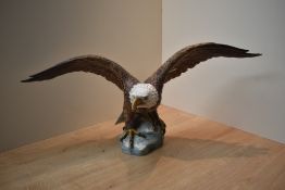 A large Goebel porcelain Osprey with wings outstretched, model number CV 104, measures 50cm