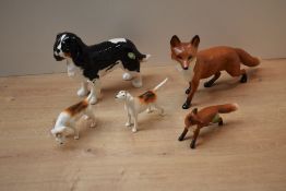 A group of five Beswick Pottery animal studies comprising Fox (Standing) model number 1016A designed