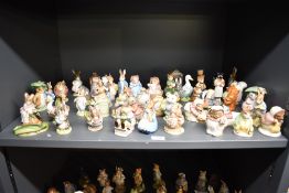A large selection of Royal Albert, Beswick Pottery and similar Beatrix Potter character studies to