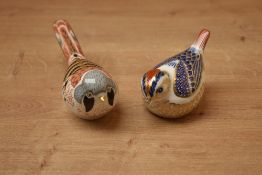 Two Royal Crown Derby bone china bird paperweights, 'Bearded Tit' and 'Goldcrest' both having