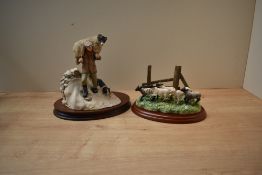 A Border Fine Arts animal group 'Winter Rescue' model number J446 designed by Anne Butler sold