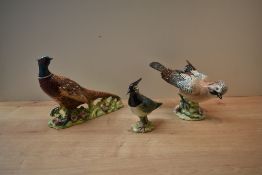 A group of three Beswick Pottery first version bird studies comprising 'Pheasant' model number